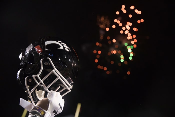 Cincinnati Bearcats player lifts his helmet after the Birmingham Bowl between Cincinnati Bearcats and Boston College Eagles on Thursday, Jan. 2, 2020, at Legion Field in Birmingham, Ala. Cincinnati Bearcats wont 38-6. Birmingham Bowl
